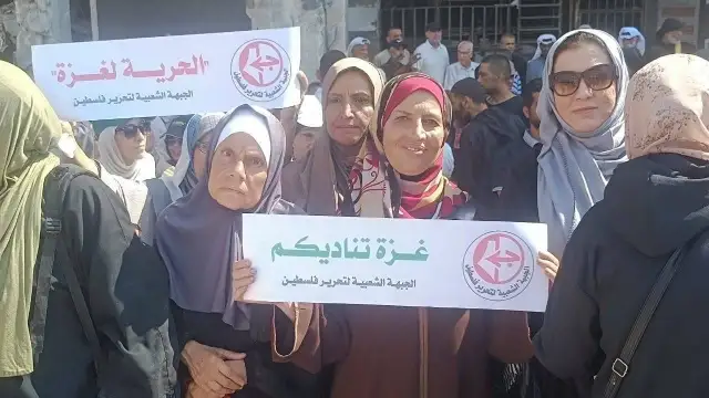 PFLP holds a demonstration at Gaza's Al-Shifa Hospital to oppose Israeli bombing of medical facilities and to draw global attention to it.